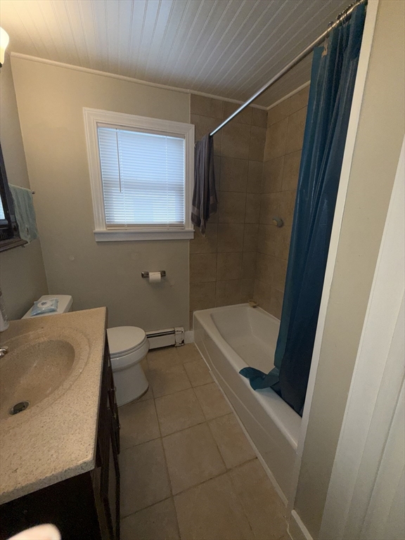 38 Ballard Street, Unit 2 Saugus, MA 01906 - Photo 13 of 17 a bathroom with a sink a toilet and bathtub