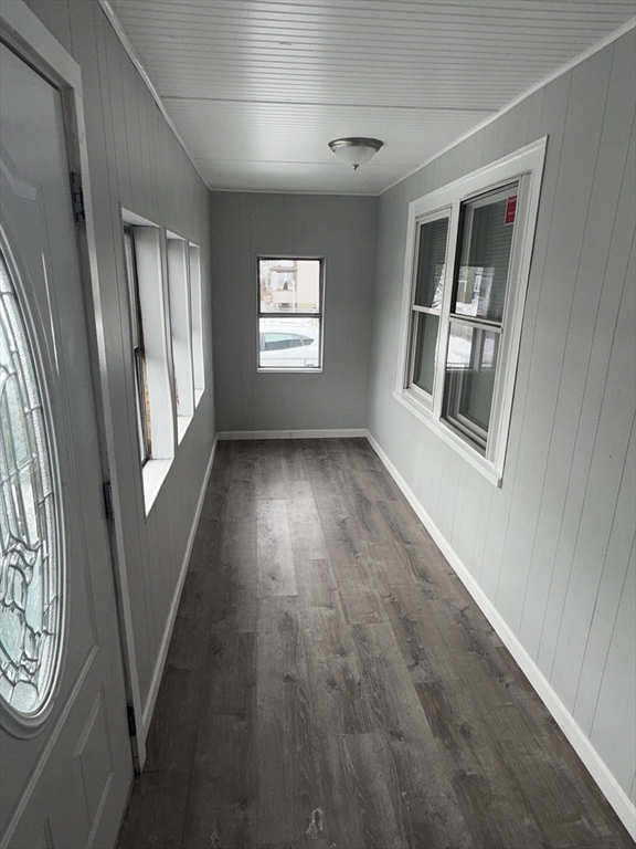 38 Ballard Street, Unit 2 Saugus, MA 01906 - Photo 2 of 17 wooden floor in an empty room with a window