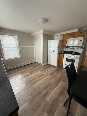 a bed room with a bed furniture and a window