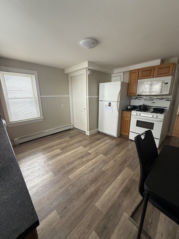 38 Ballard Street, Unit 2 Saugus, MA 01906 - Photo 7 of 17 a bed room with a bed furniture and a window