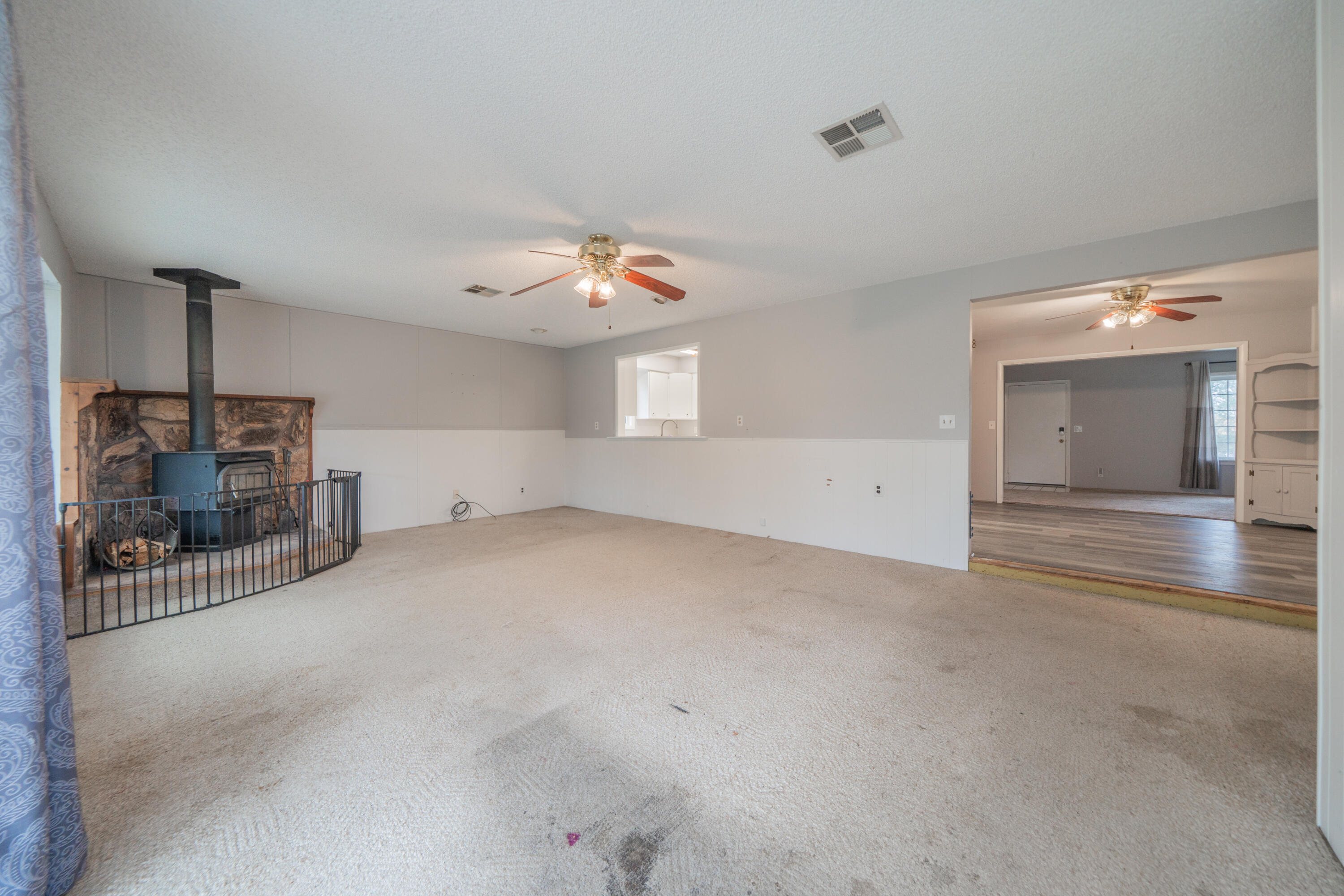 3586 East Keswick Dam Road Redding, CA 96003 - Photo 12 of 29 Family Room with Wood Stove