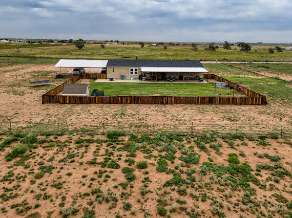 6341 Farm Private Road Levelland, TX 79336 - Photo 40 of 46 a view of a city with an ocean view