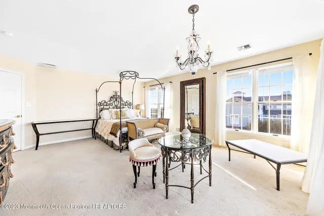 a bathroom with a tub and a sink