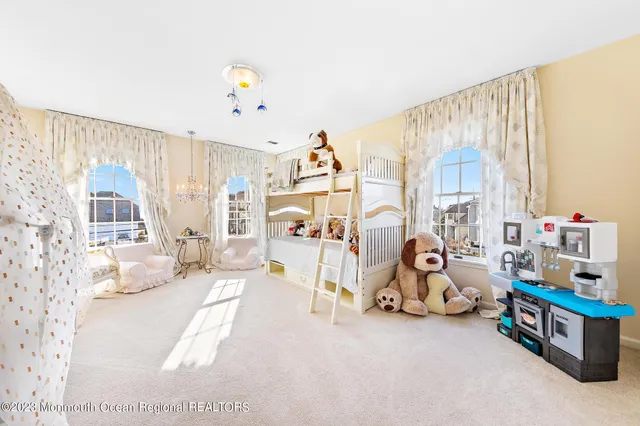a view of a chairs and table in the balcony