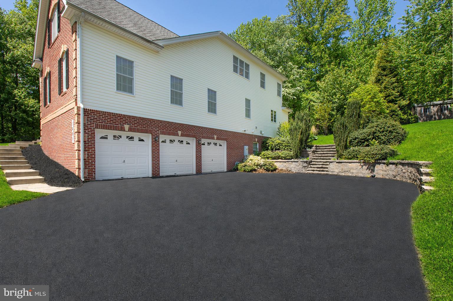 1601 Rushing Stream Court Forest Hill, MD 21050 - Photo 7 of 72 3-car garage with asphalt driveway