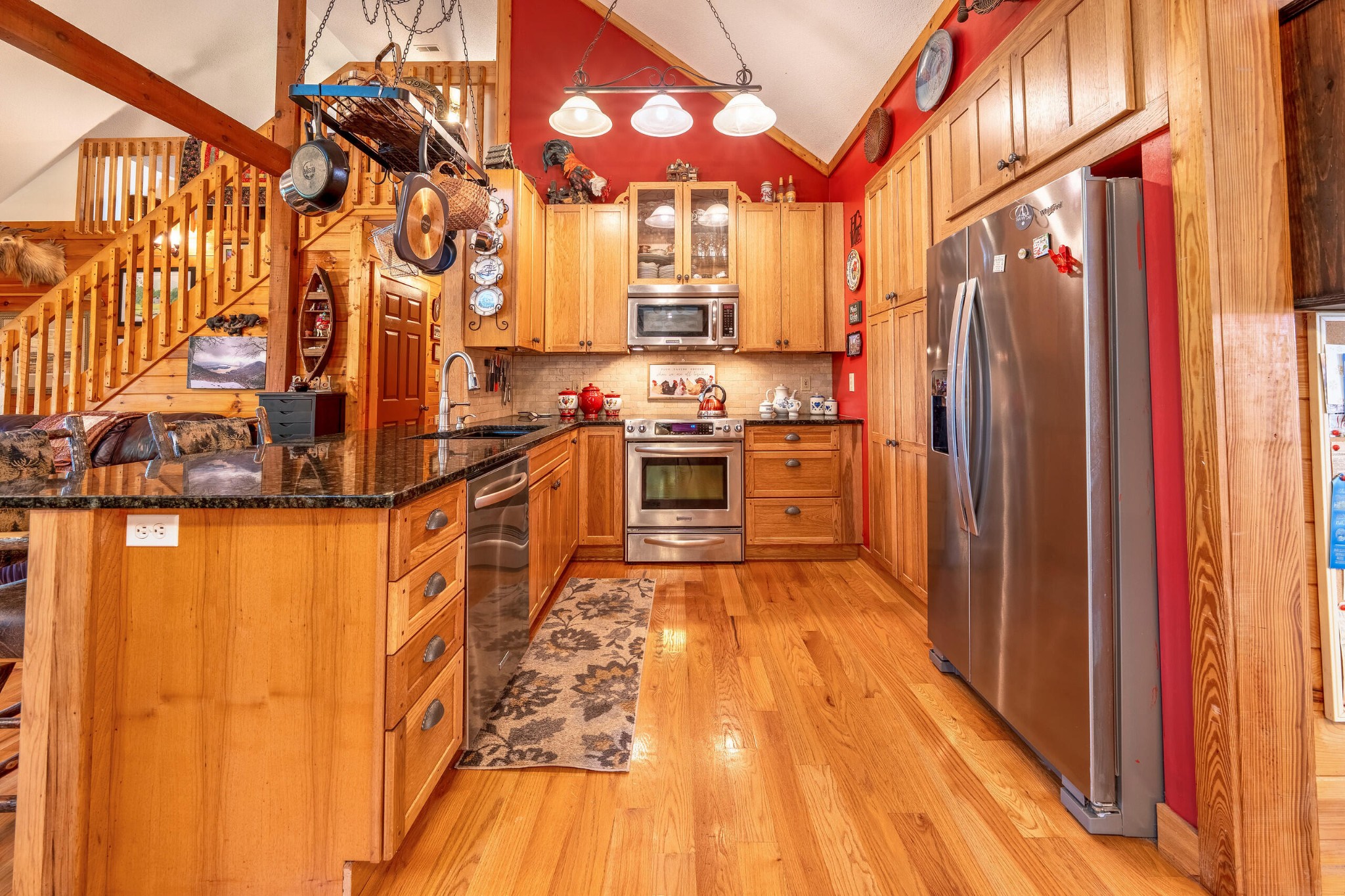 260 Deer Ridge Trail Ocoee, TN 37361 - Photo 42 of 72 a kitchen with stainless steel appliances a refrigerator and a stove