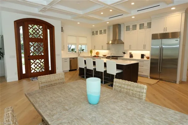 a kitchen with lots of counter top space and appliances
