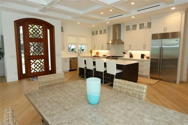 a kitchen with lots of counter top space and appliances