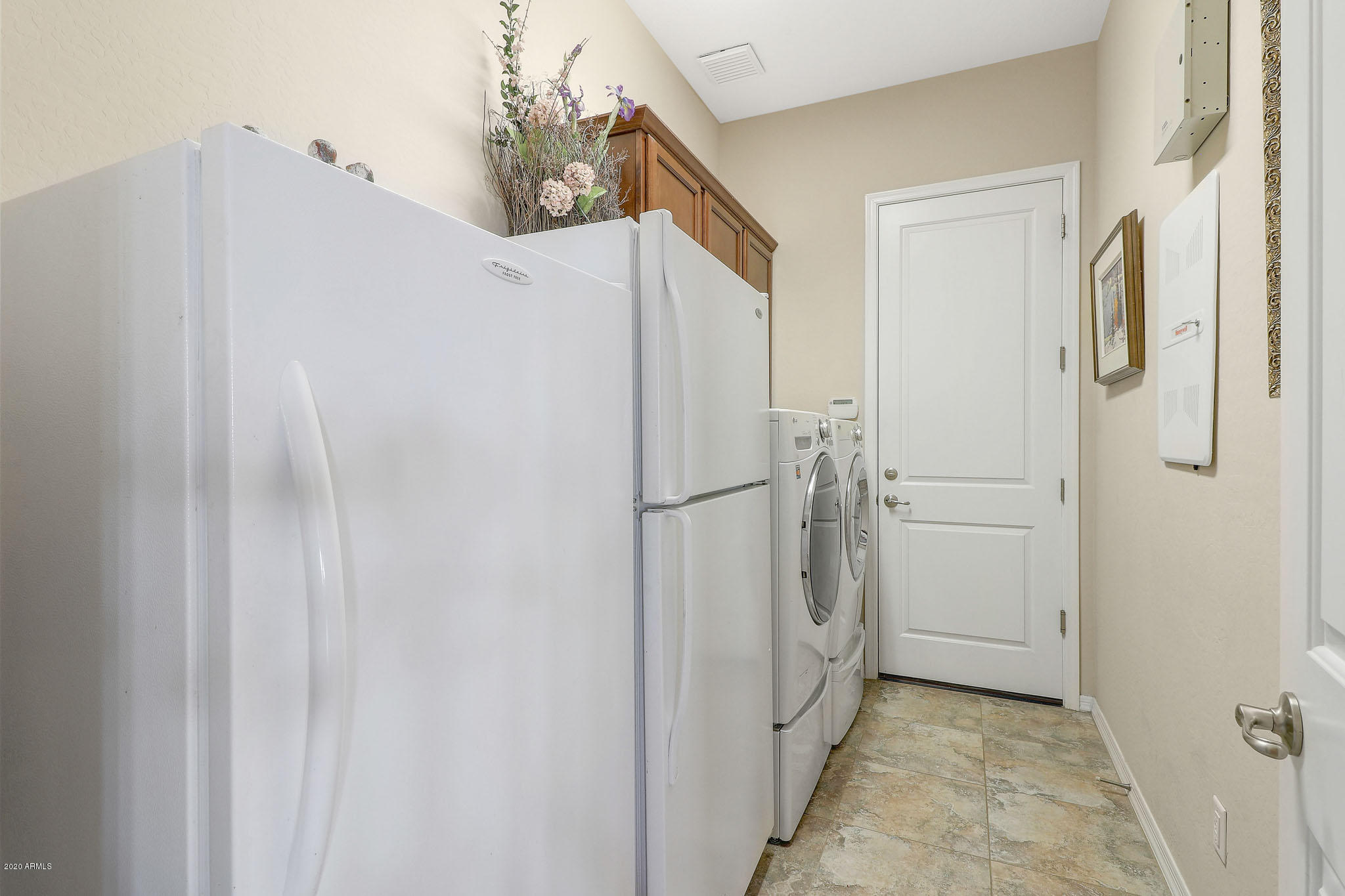 18325 West Desert Trumpet Road Goodyear, AZ 85338 - Photo 31 of 70 Extended Laundry Room