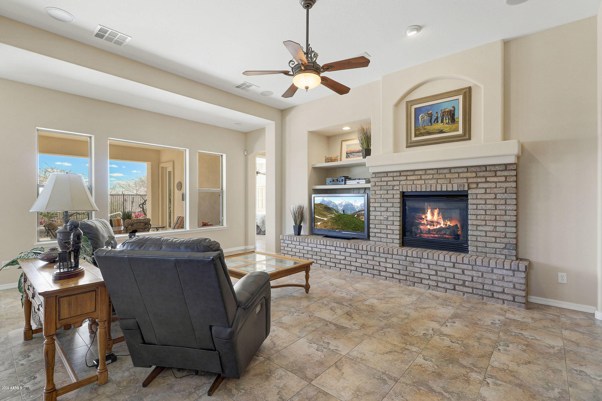 18325 West Desert Trumpet Road Goodyear, AZ 85338 - Photo 7 of 70 Gas Fireplace in the Family Room
