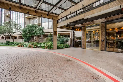 a view of a building with a street