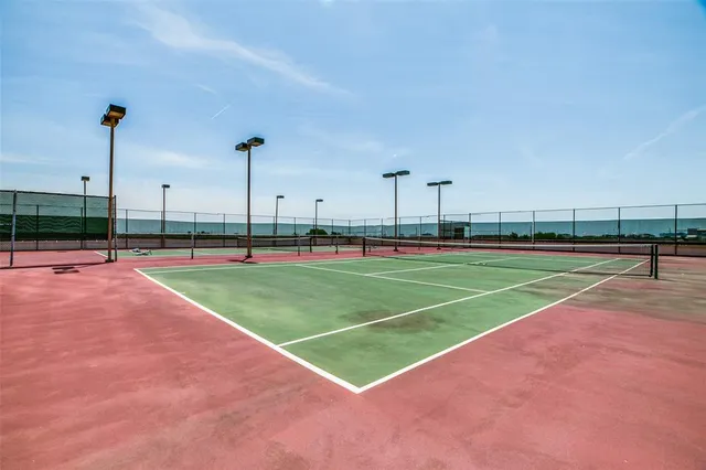 a view of a lake with a yard and lake view