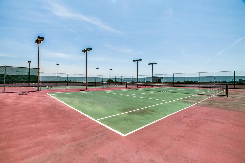 5200 Keller Springs Road, Unit 824 Dallas, TX 75248 - Photo 20 of 26 a view of a tennis court