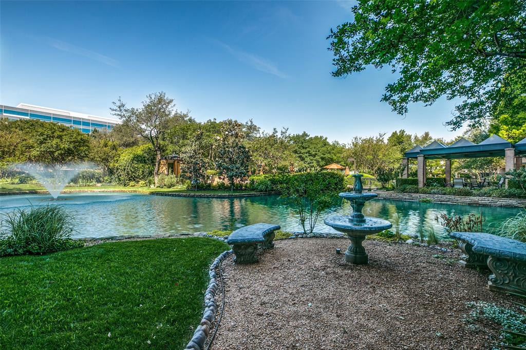 5200 Keller Springs Road, Unit 824 Dallas, TX 75248 - Photo 22 of 26 a view of a lake with a yard and lake view