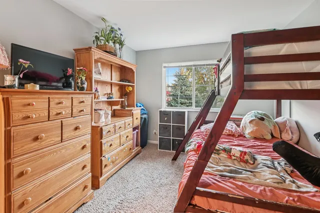 a view of an empty room and dresser