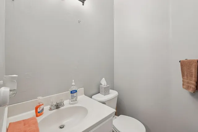 a bathroom with a sink and a toilet