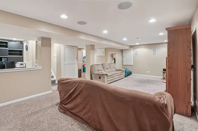 a bed room with a bed and a television