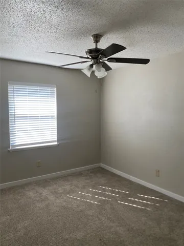 a view of a window in an empty room