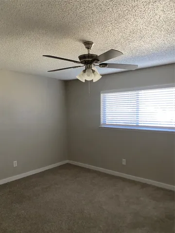 en empty room with a window