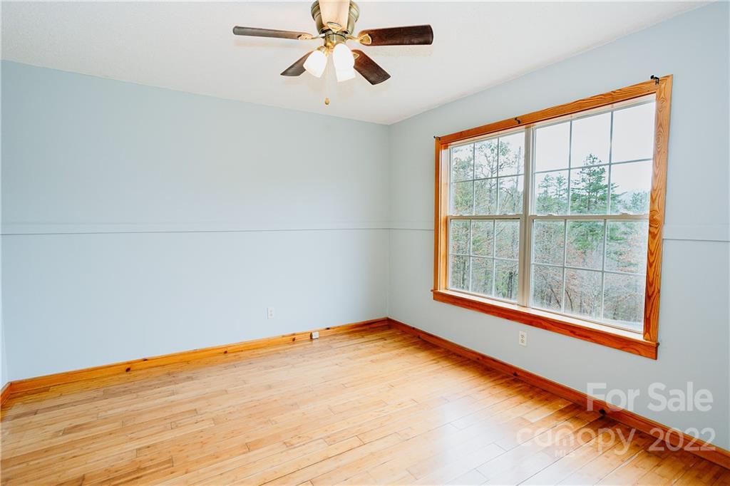 300 Boyd Road Leicester, NC 28748 - Photo 12 of 46 a view of an empty room with a window