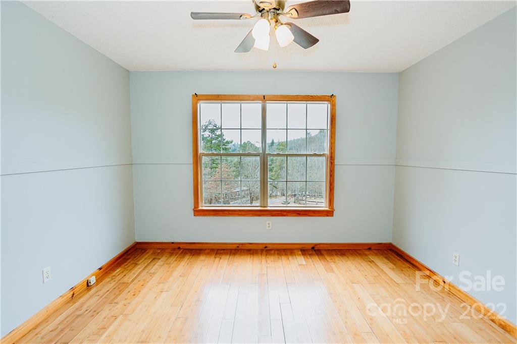 300 Boyd Road Leicester, NC 28748 - Photo 13 of 46 an empty room with a window