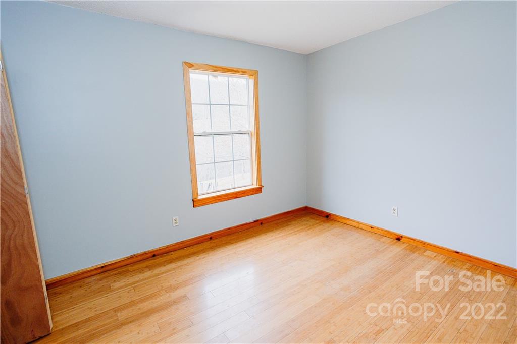 300 Boyd Road Leicester, NC 28748 - Photo 19 of 46 an empty room with a window