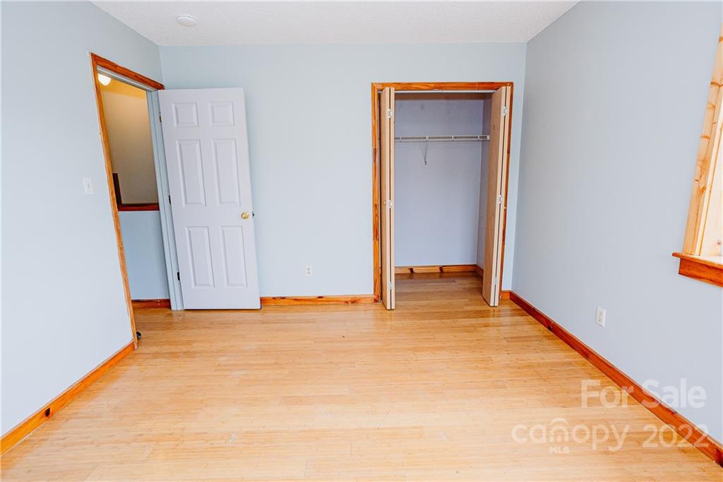 300 Boyd Road Leicester, NC 28748 - Photo 25 of 46 a view of an empty room with closet