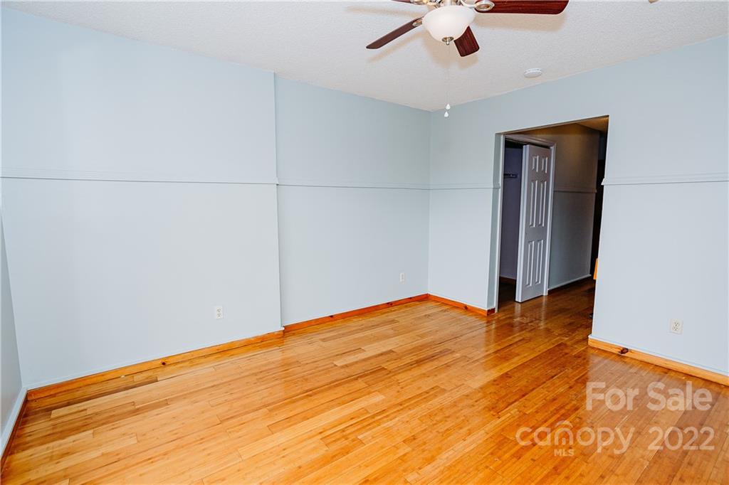 300 Boyd Road Leicester, NC 28748 - Photo 30 of 46 a view of empty room with wooden floor