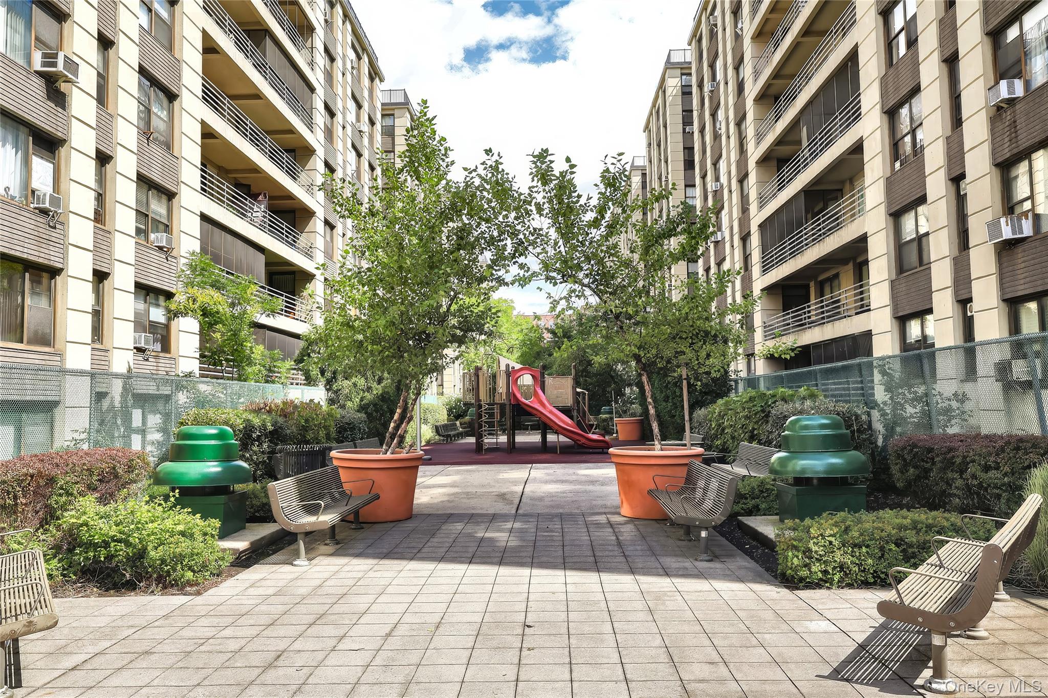 98-25 64th Road, Unit 8C Queens, NY 11374 - Photo 23 of 23 Residents Pvt seating area with play area.