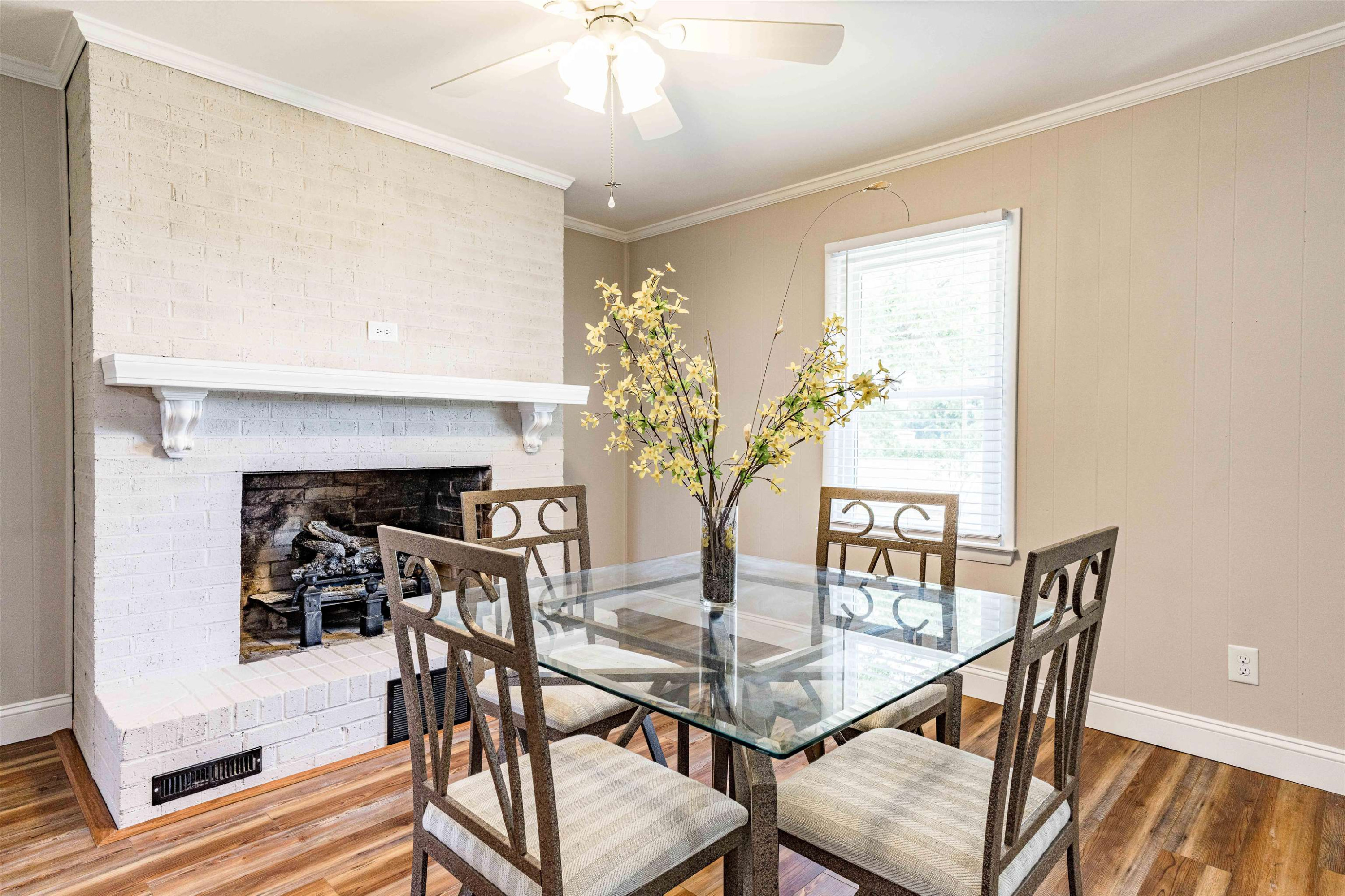 420 Faith Church Road Four Oaks, NC 27524 - Photo 12 of 36 a view of a dining room with furniture and a potted plant