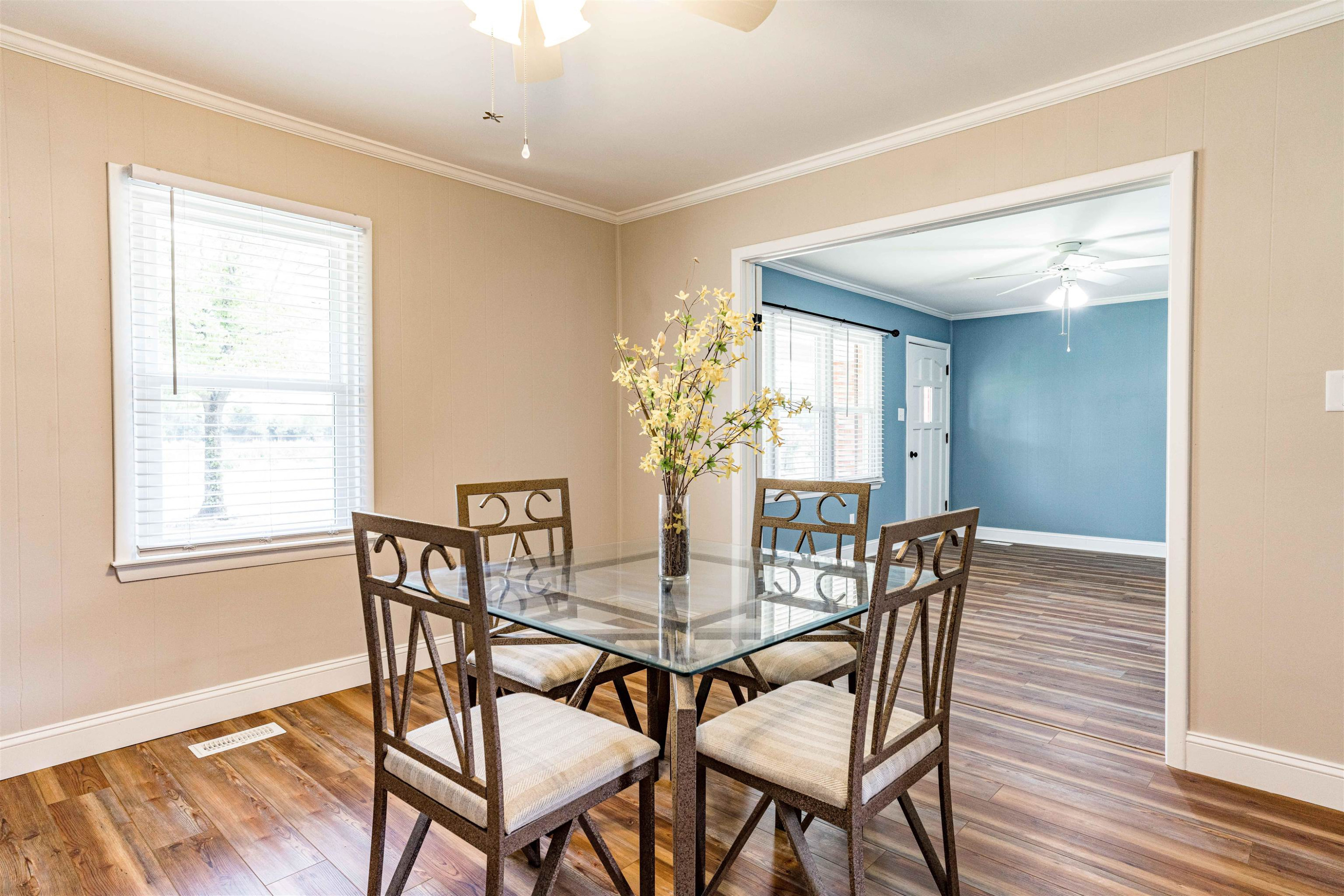 420 Faith Church Road Four Oaks, NC 27524 - Photo 13 of 36 a view of a dining room with furniture and wooden floor