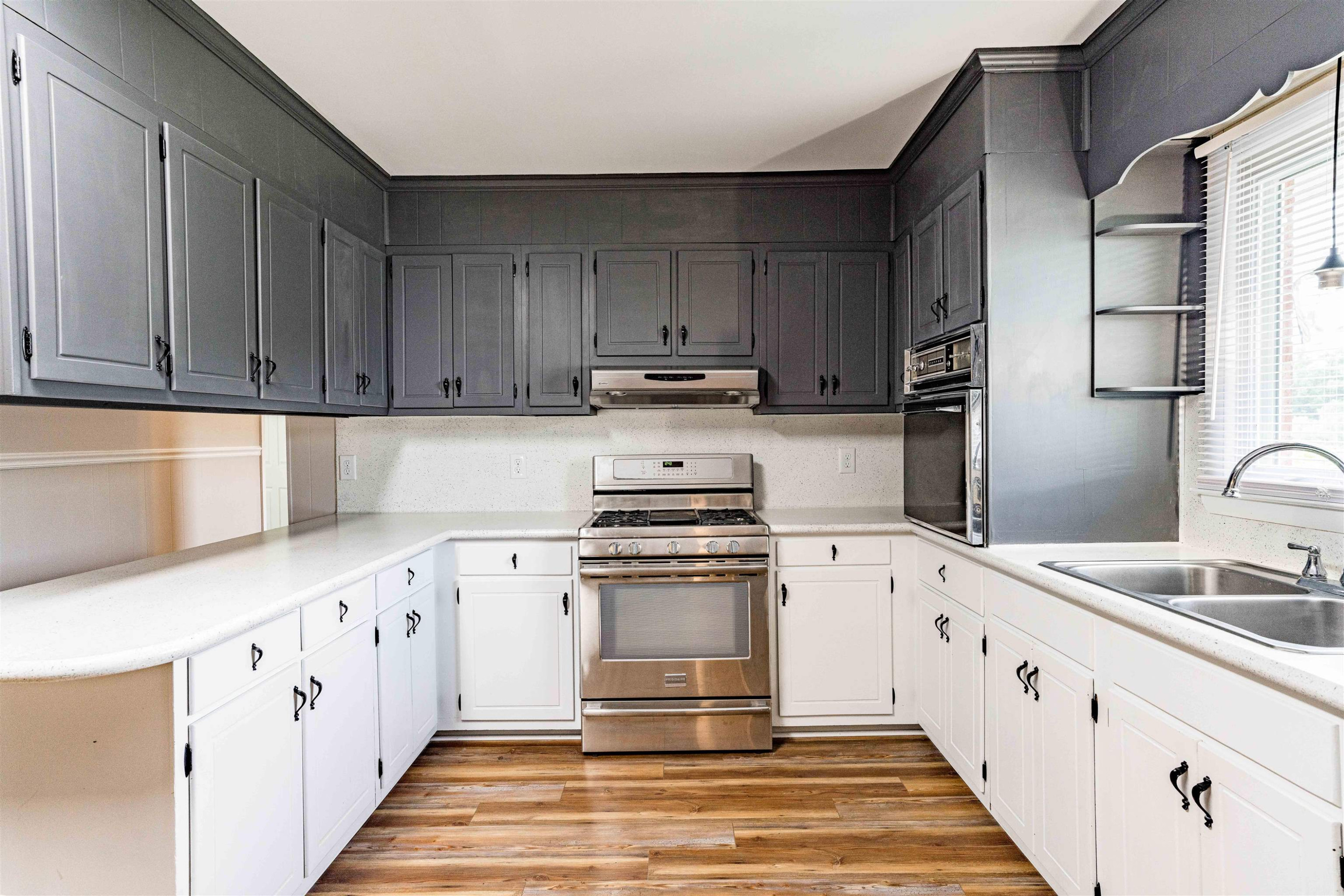 420 Faith Church Road Four Oaks, NC 27524 - Photo 15 of 36 a kitchen with a stove oven and cabinets