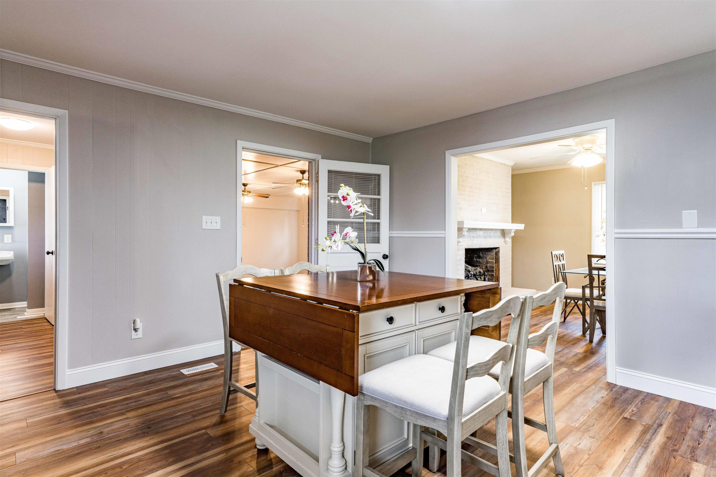 420 Faith Church Road Four Oaks, NC 27524 - Photo 19 of 36 a view of a dining room with furniture window and wooden floor
