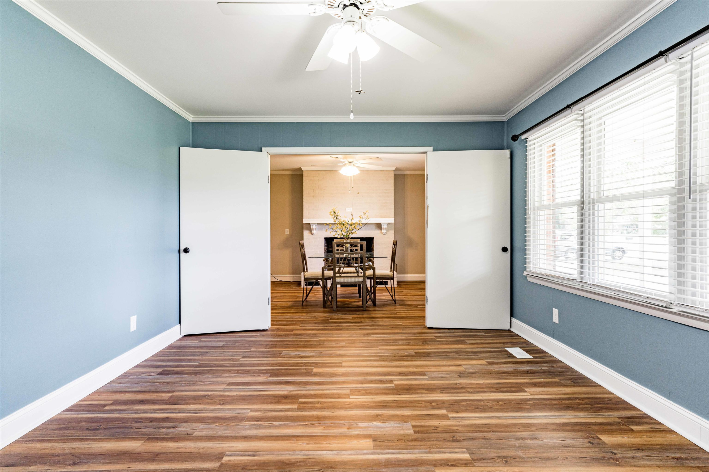 420 Faith Church Road Four Oaks, NC 27524 - Photo 24 of 36 a view of empty room with wooden floor and a window