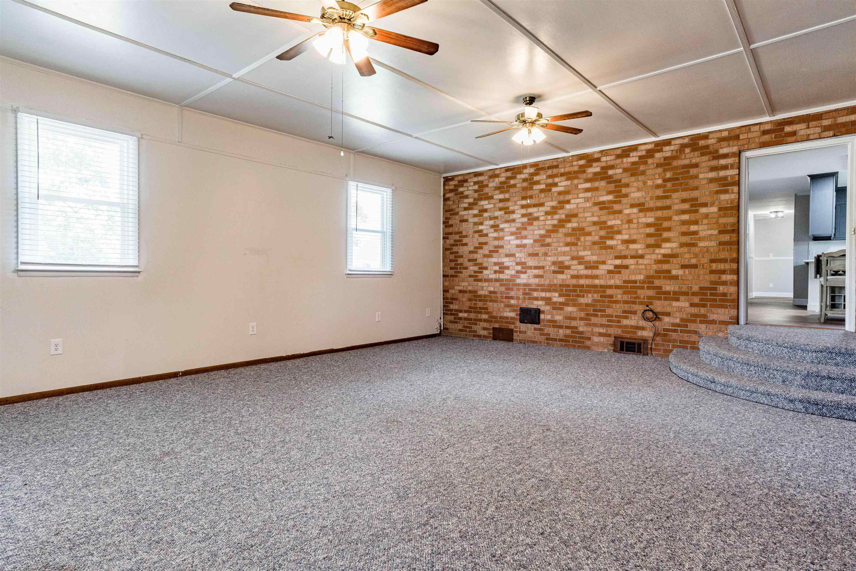 420 Faith Church Road Four Oaks, NC 27524 - Photo 29 of 36 a view of an empty room with a window