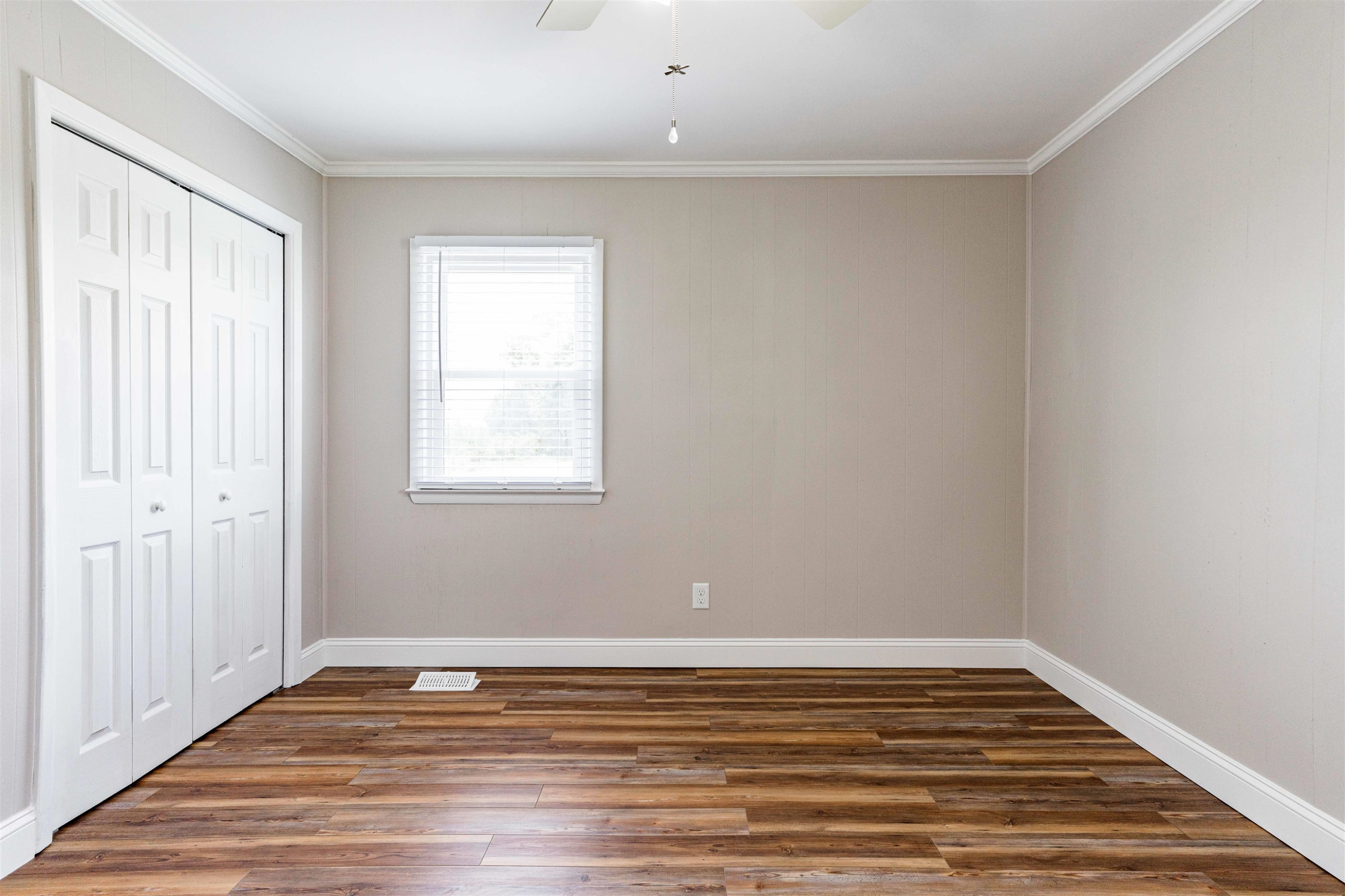 420 Faith Church Road Four Oaks, NC 27524 - Photo 36 of 36 a view of a room with wooden floor and window