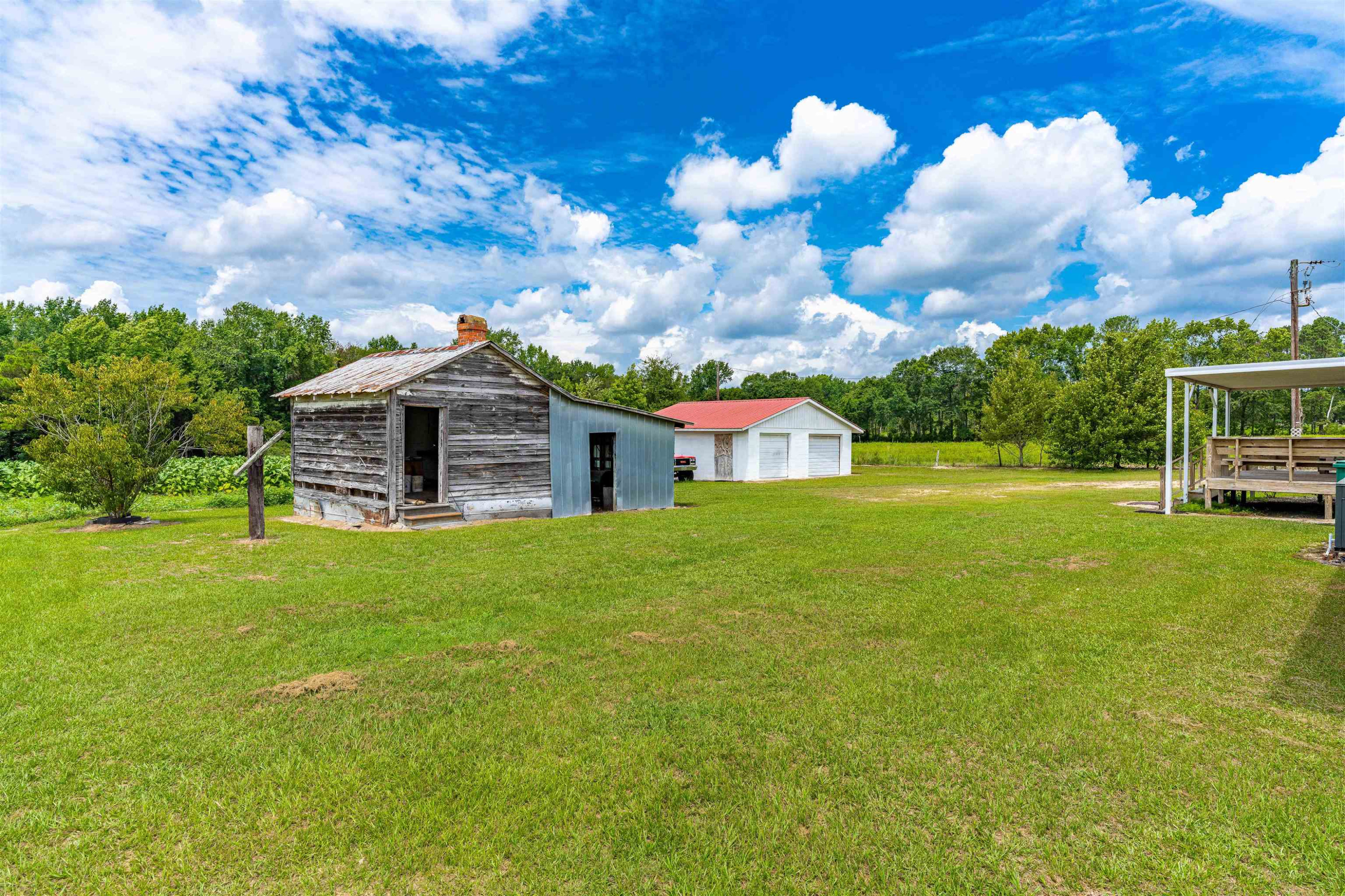 420 Faith Church Road Four Oaks, NC 27524 - Photo 7 of 36 a front view of a house with garden