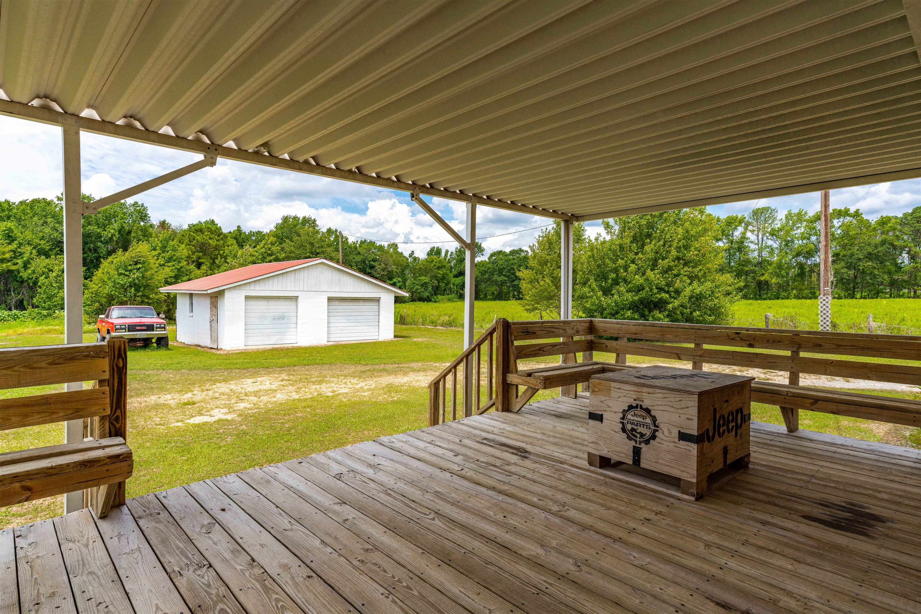 420 Faith Church Road Four Oaks, NC 27524 - Photo 9 of 36 a view of a swimming pool with a patio
