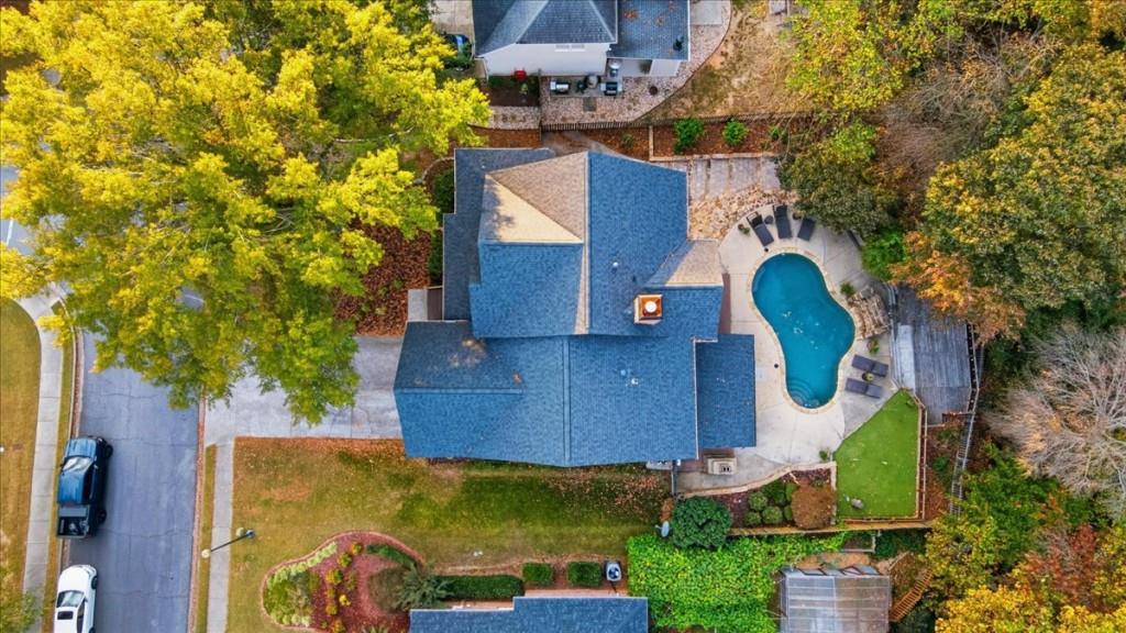3222 Green Farm Trail Dacula, GA 30019 - Photo 3 of 92 an aerial view of a house with swimming pool and large trees