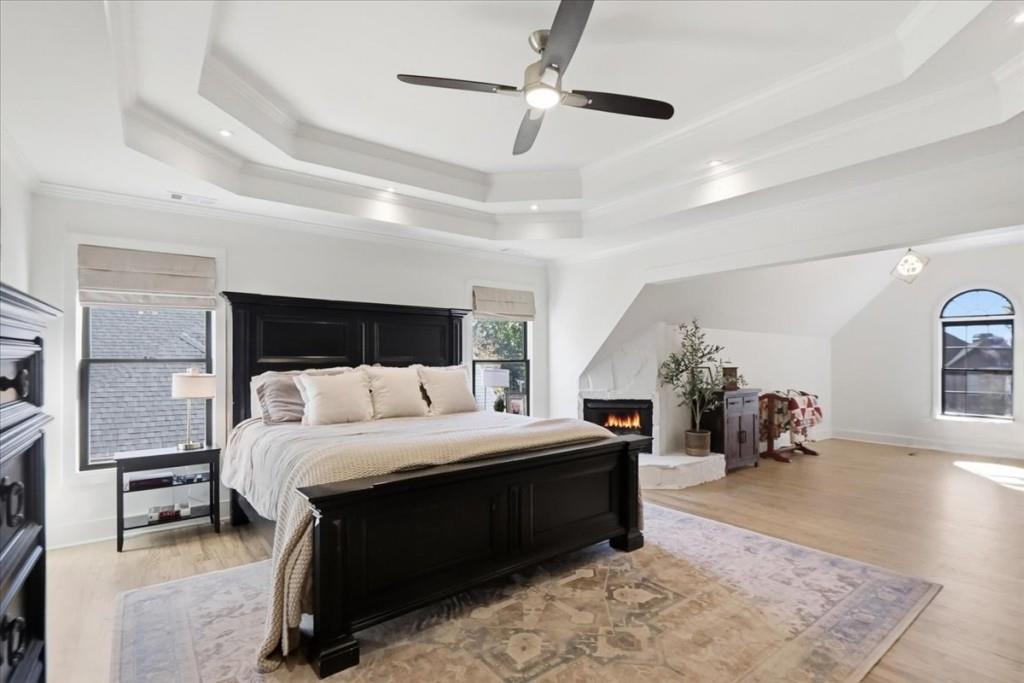 3222 Green Farm Trail Dacula, GA 30019 - Photo 35 of 92 a bed room with a bed and a chandelier