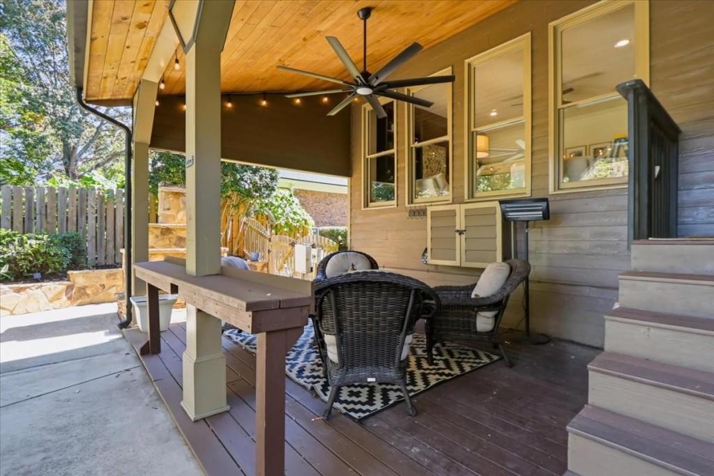 3222 Green Farm Trail Dacula, GA 30019 - Photo 72 of 92 a view of an outdoor dining space with a table and chairs