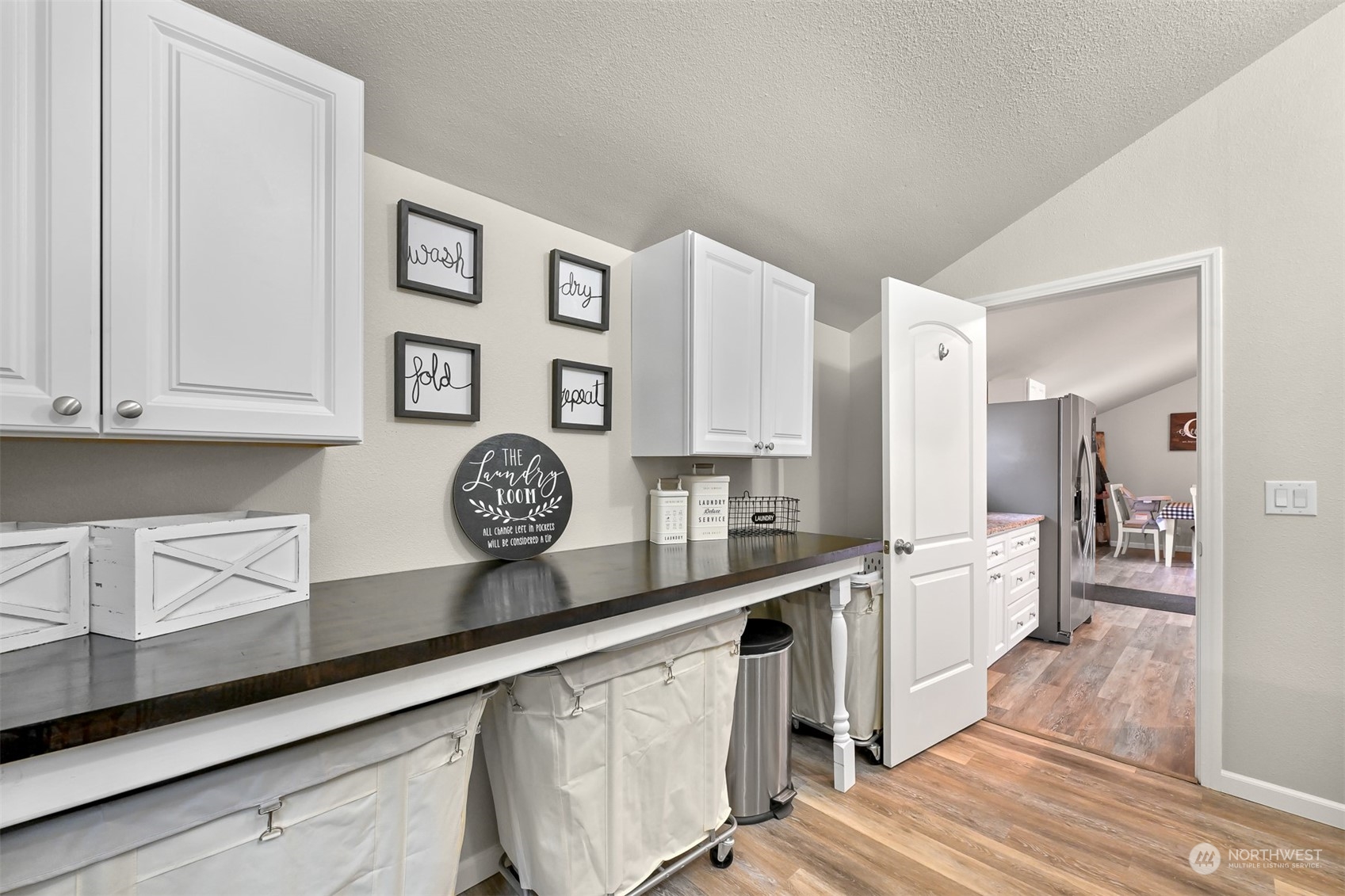 3516 Mountain View Road Ferndale, WA 98248 - Photo 10 of 40 a very nice looking living room with stainless steel appliances granite countertop lots of white cabinets a sink and dishwasher