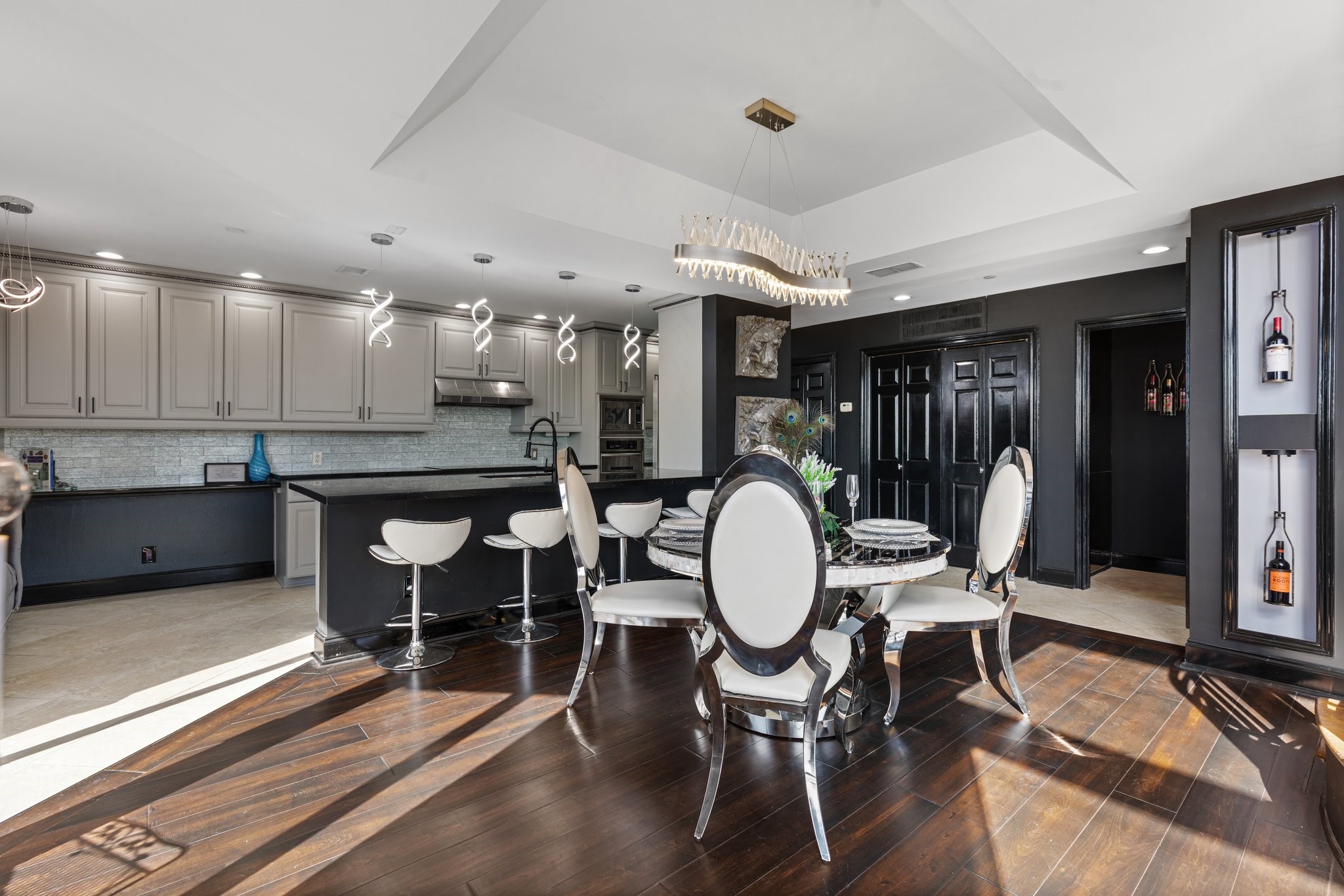 3350 McCue Road, Unit 2404 Houston, TX 77056 - Photo 13 of 49 a kitchen with a dining table chairs and a chandelier