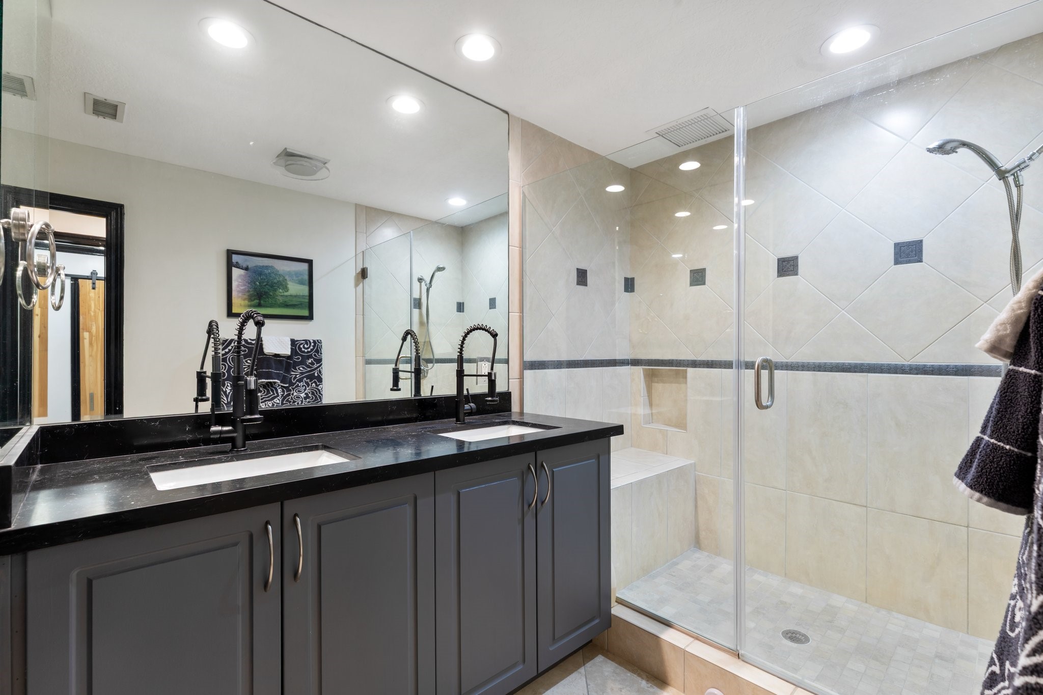 3350 McCue Road, Unit 2404 Houston, TX 77056 - Photo 30 of 49 a bathroom with a double vanity sink and a mirror