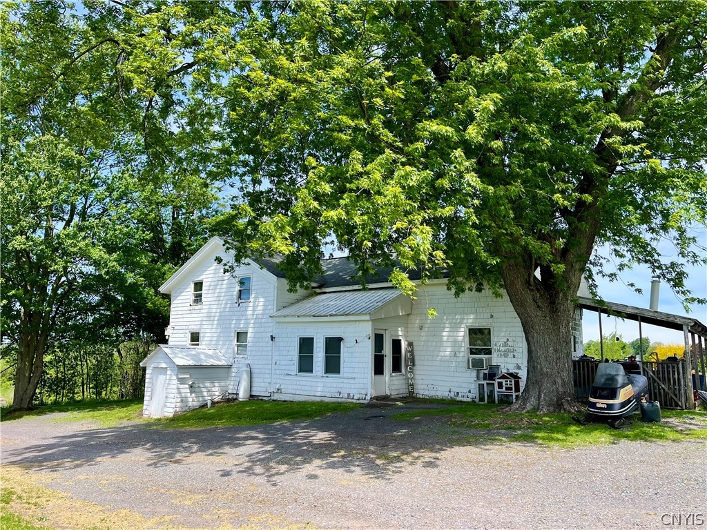 2086 State Route Sterling, NY 13156 - Photo 3 of 15 Side view of the home