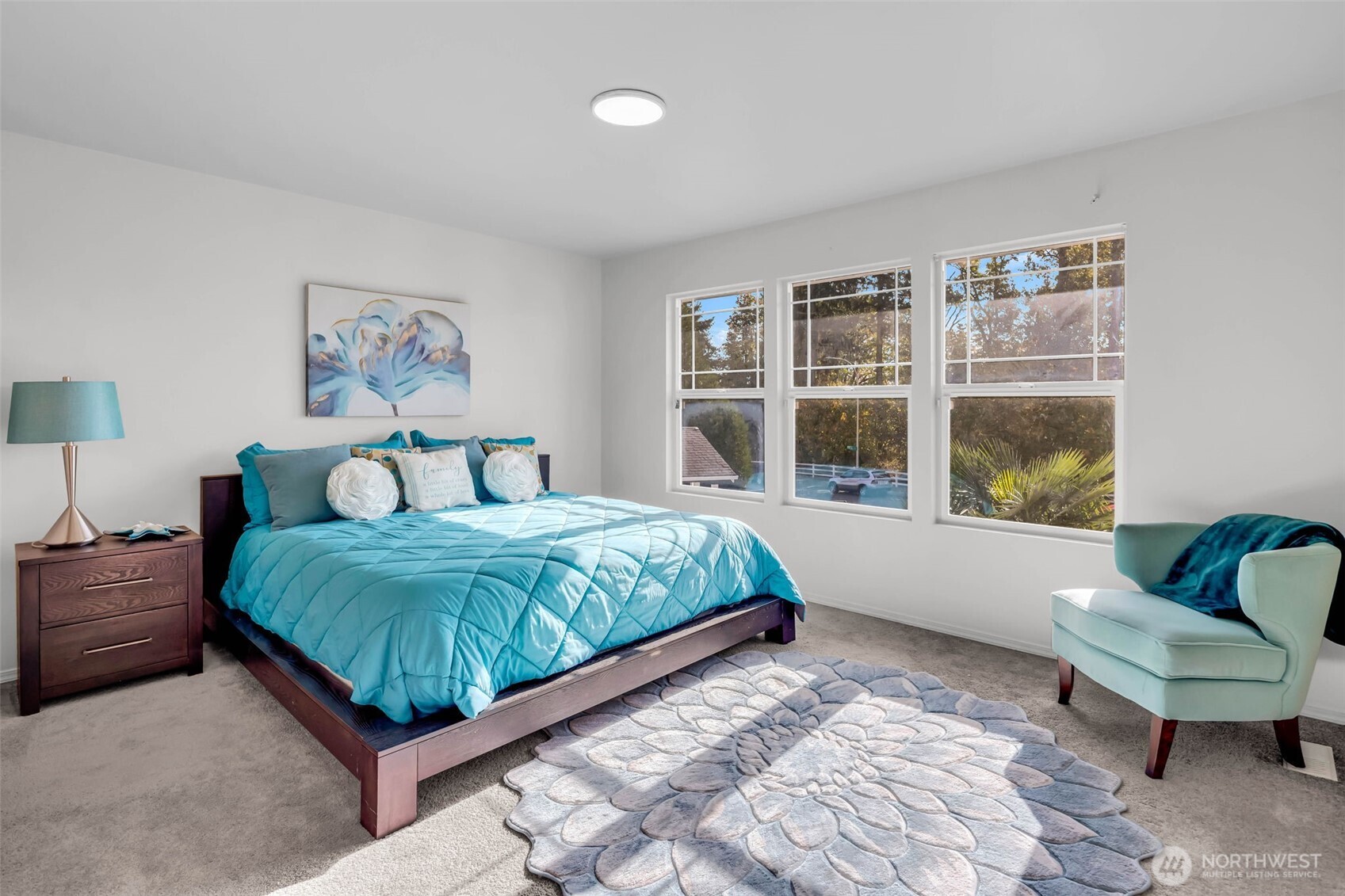12830 Southeast 299th Street Auburn, WA 98092 - Photo 13 of 30 a bedroom with a bed and a large window