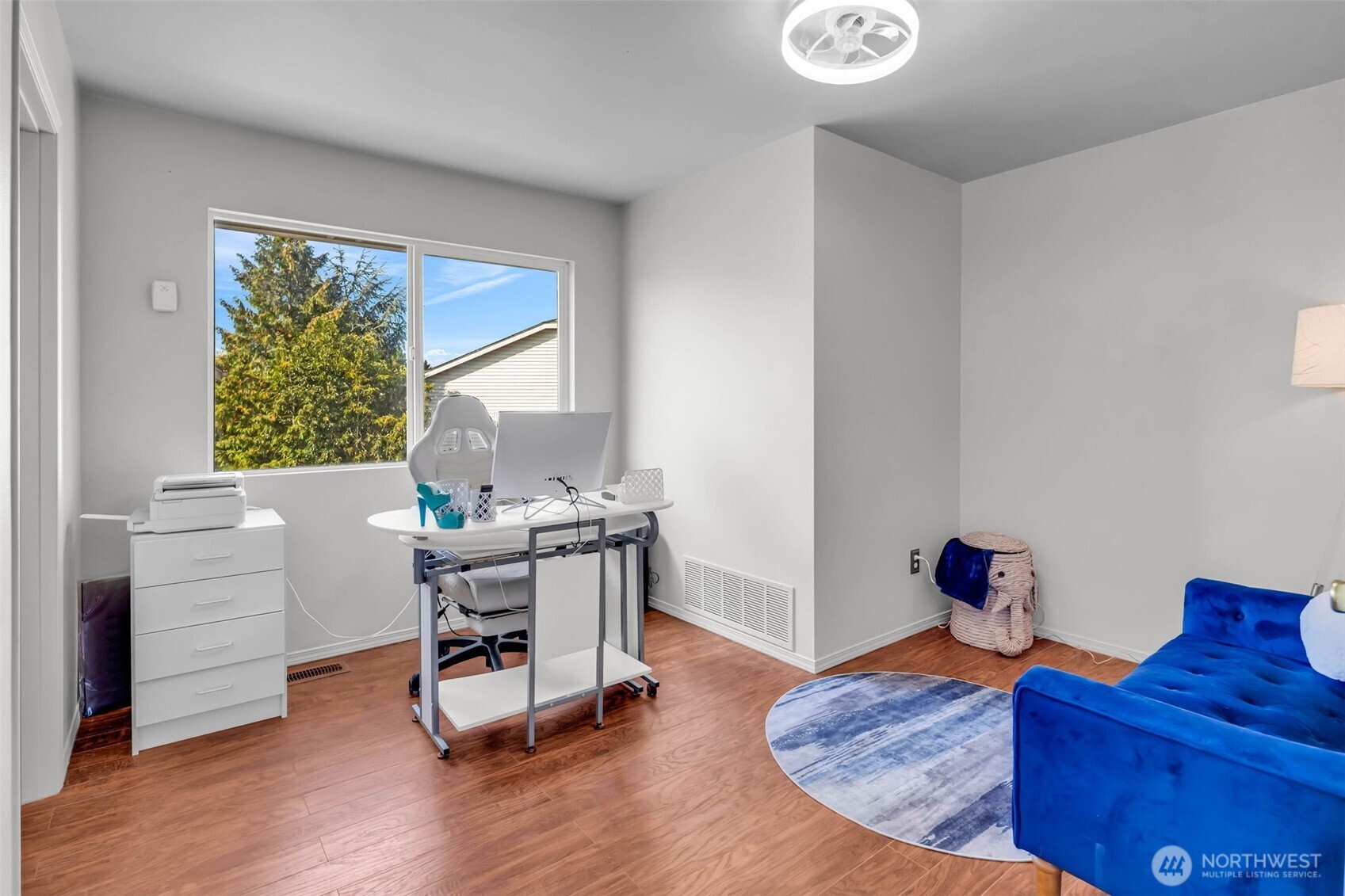 12830 Southeast 299th Street Auburn, WA 98092 - Photo 14 of 30 a view of a workspace with furniture and a window