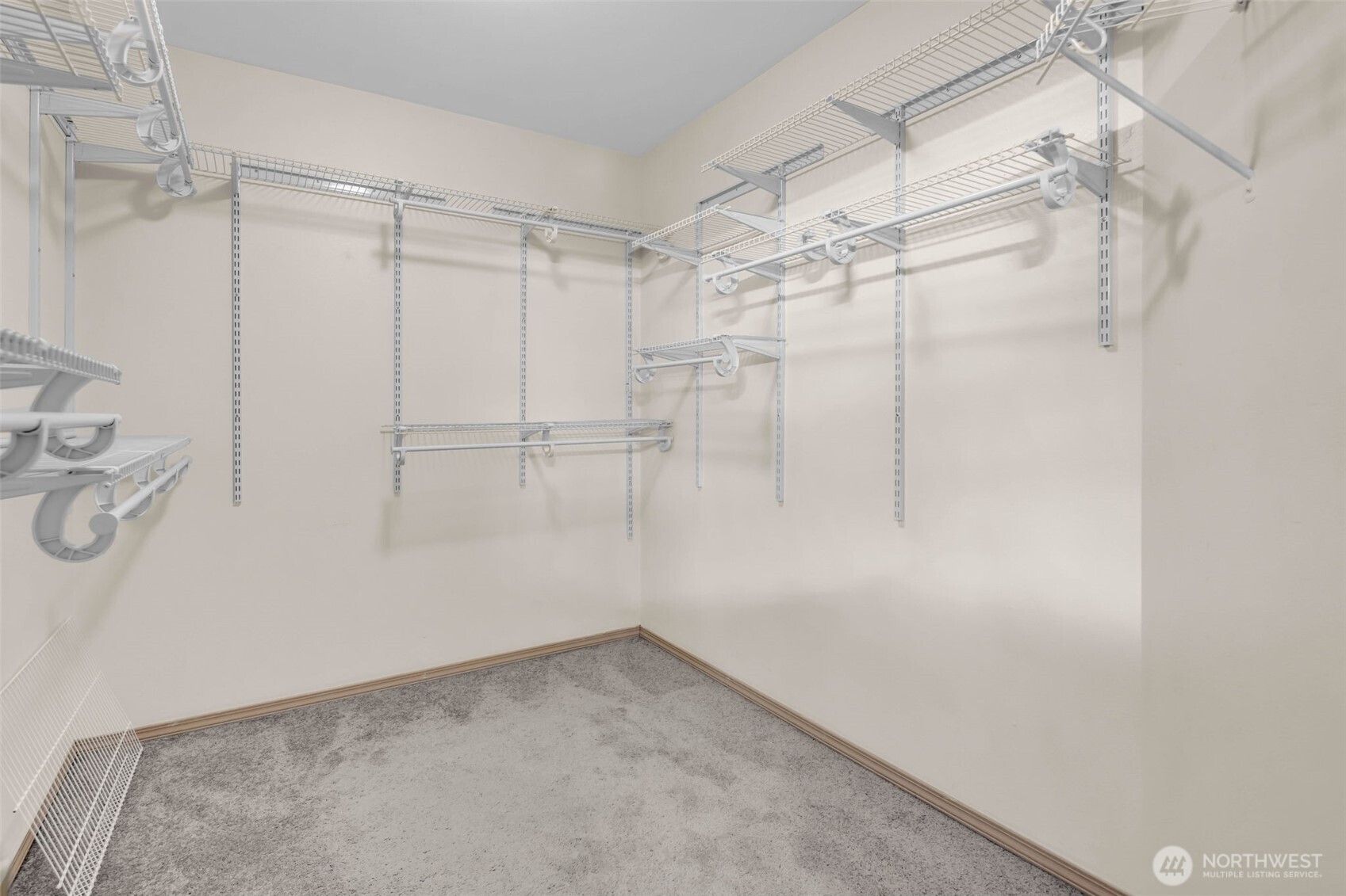 12830 Southeast 299th Street Auburn, WA 98092 - Photo 19 of 30 a view of a room with racks on the wall