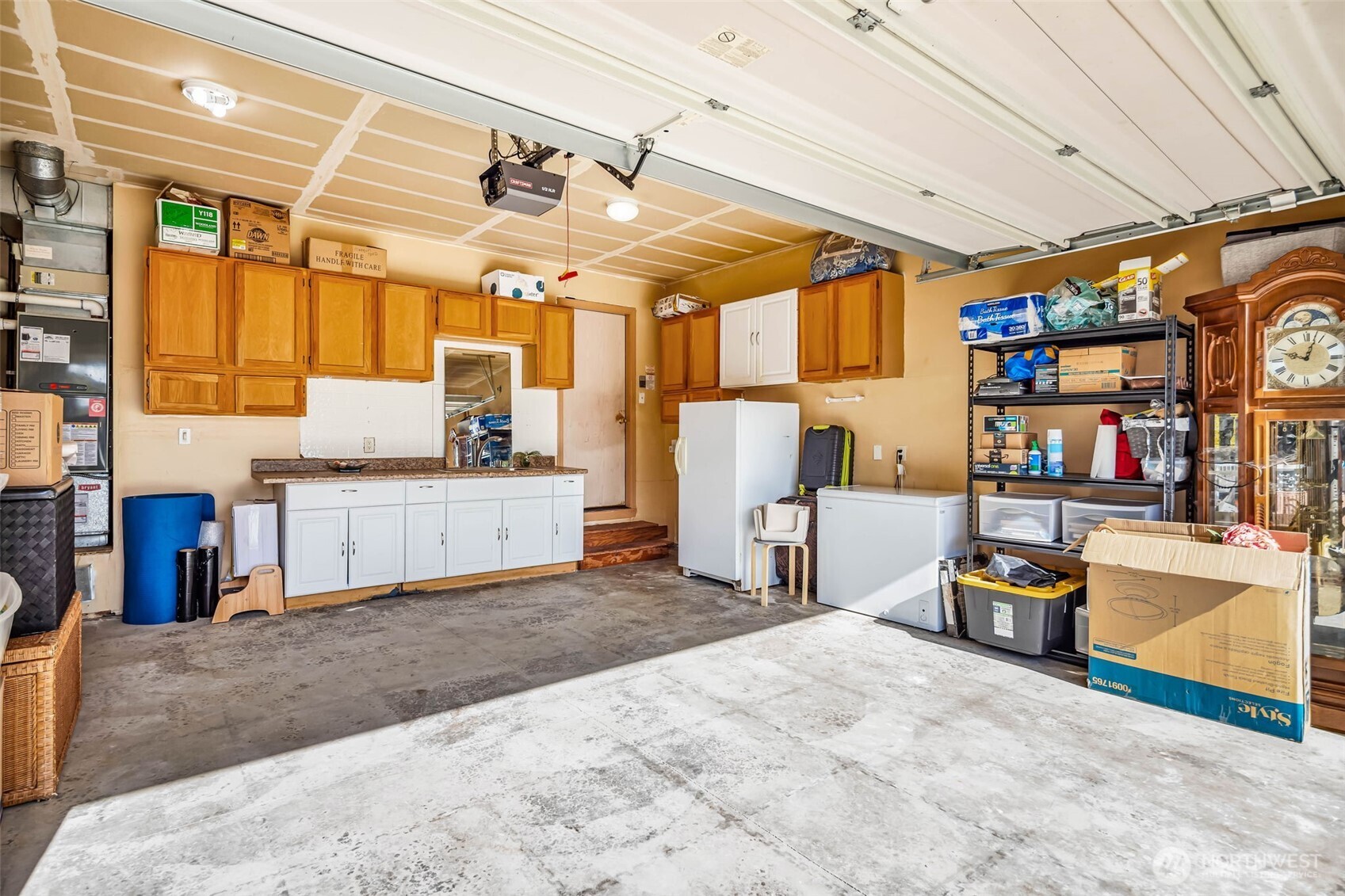 12830 Southeast 299th Street Auburn, WA 98092 - Photo 20 of 30 a bedroom with furniture and a flat screen tv