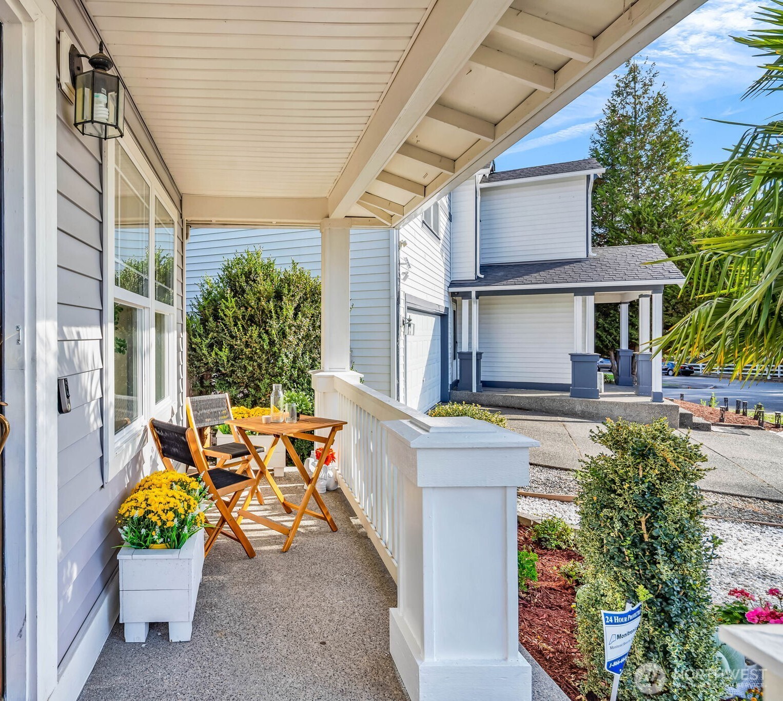 12830 Southeast 299th Street Auburn, WA 98092 - Photo 2 of 30 a view of a patio with couches table and chairs and potted plants
